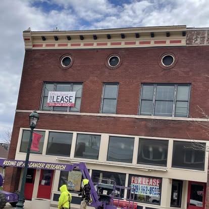 Historic brick commercial building with metal cornice