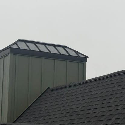 Green standing-seam cupola with skylight
