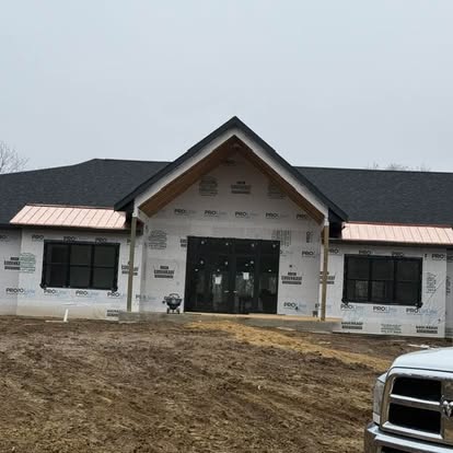 New construction with metal porch overhang trim